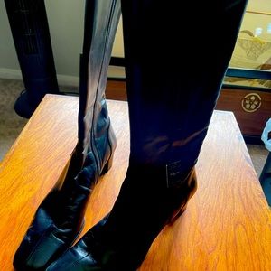 Knee high black leather boots